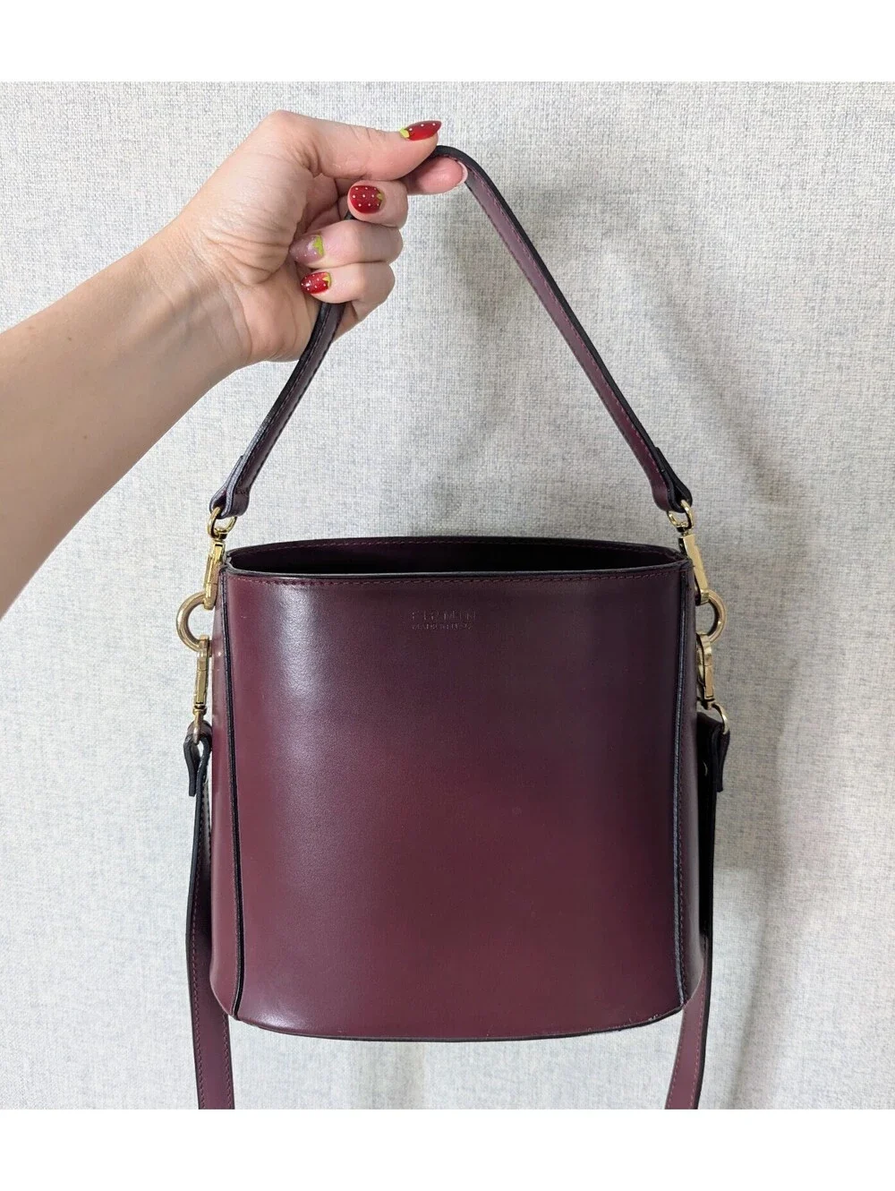 Firmin Made in Italy burgundy leather bucket bag